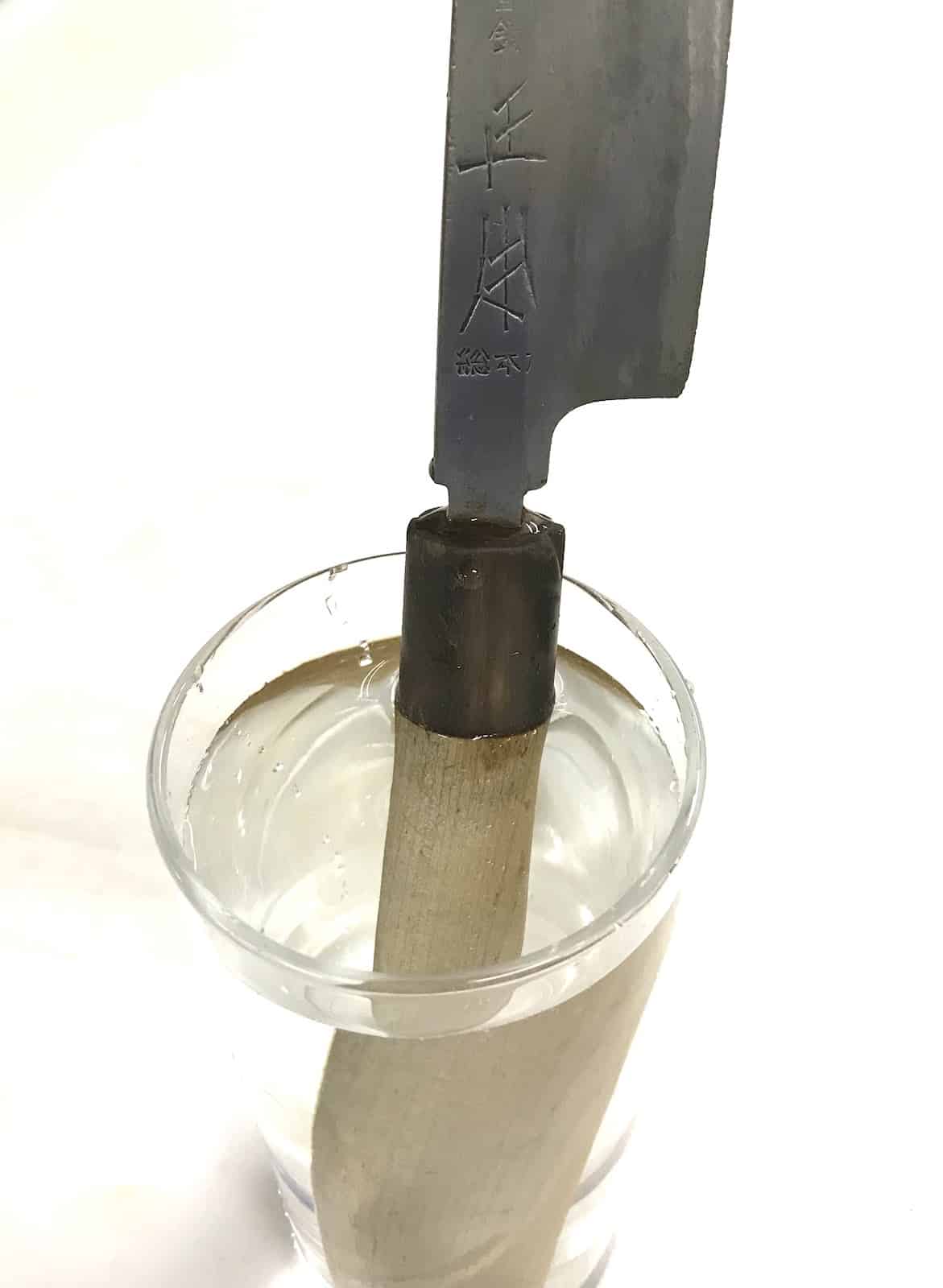 Sometimes put diluted bleach in a cup and soak only the handle to sanitize it.