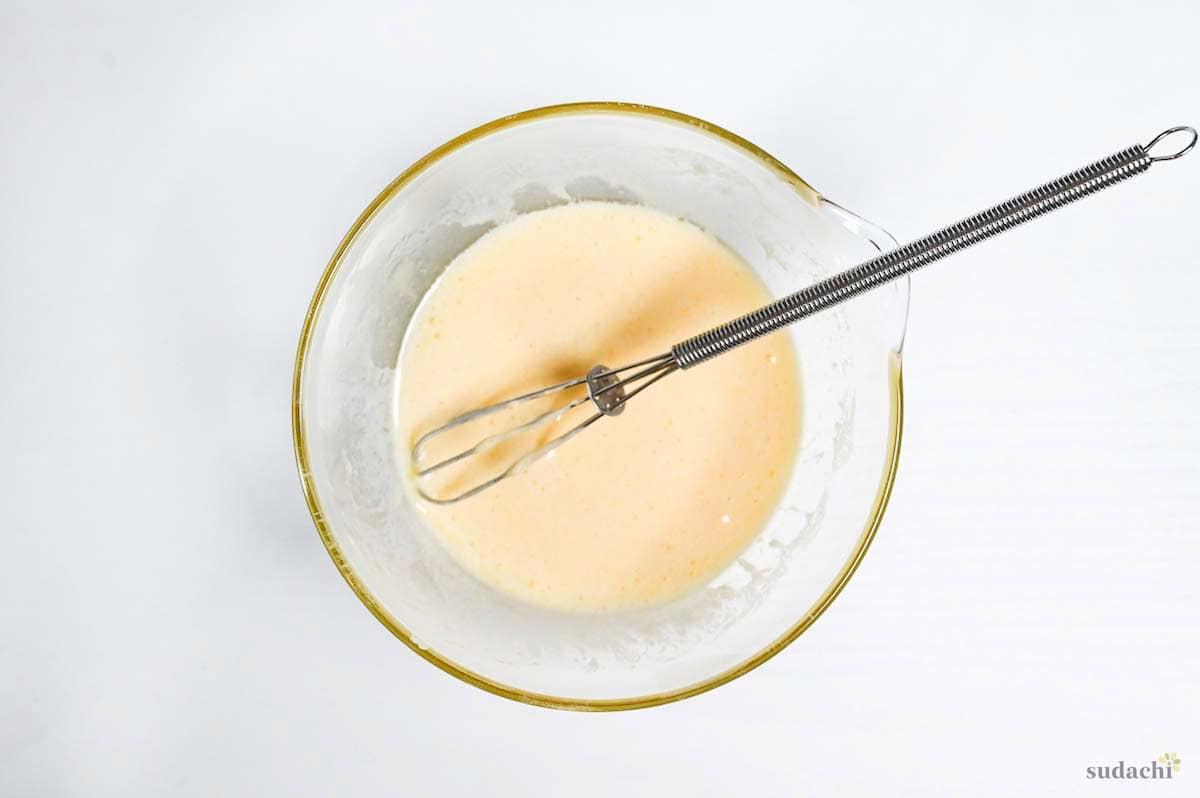 milk, oil and a small amount of castella cake batter whisked together in a small bowl
