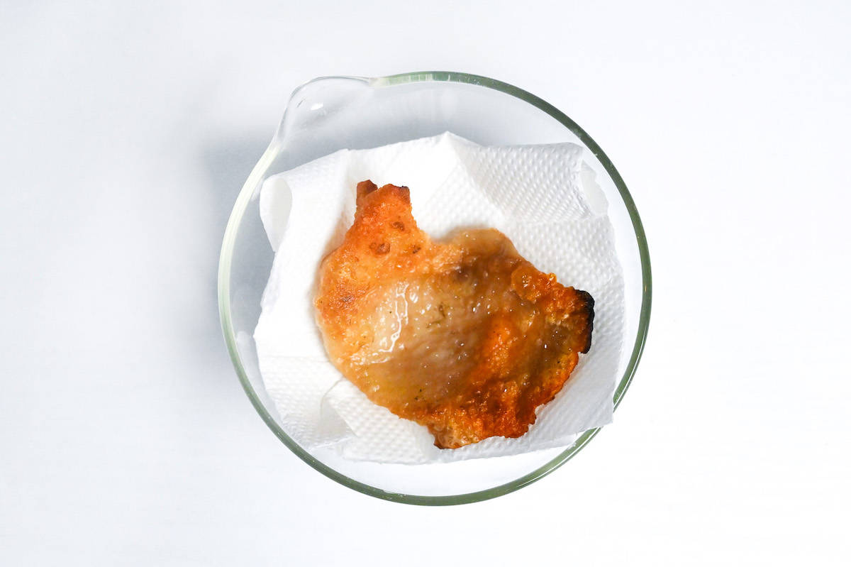crispy chicken skin on kitchen paper