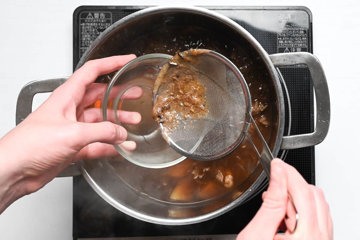 Scooping the scum off the surface of Japanese curry