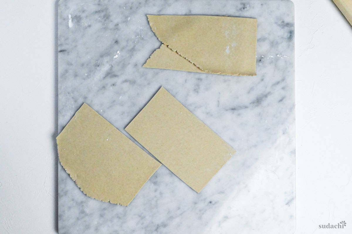 soba noodle dough cut into four pieces