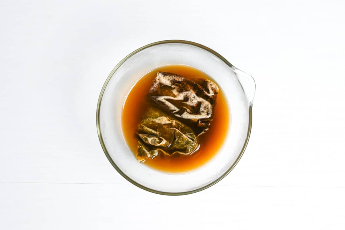 hojicha and sugar concentrated mixture in glass bowl