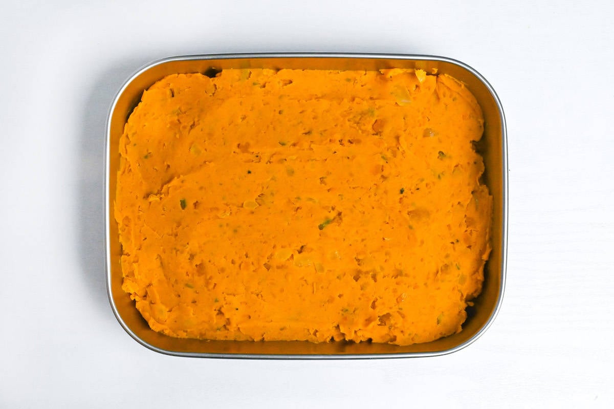 chilling kabocha korokke filling in a steel container