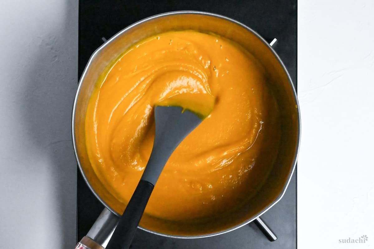 smooth kabocha soup in a pot on stove top