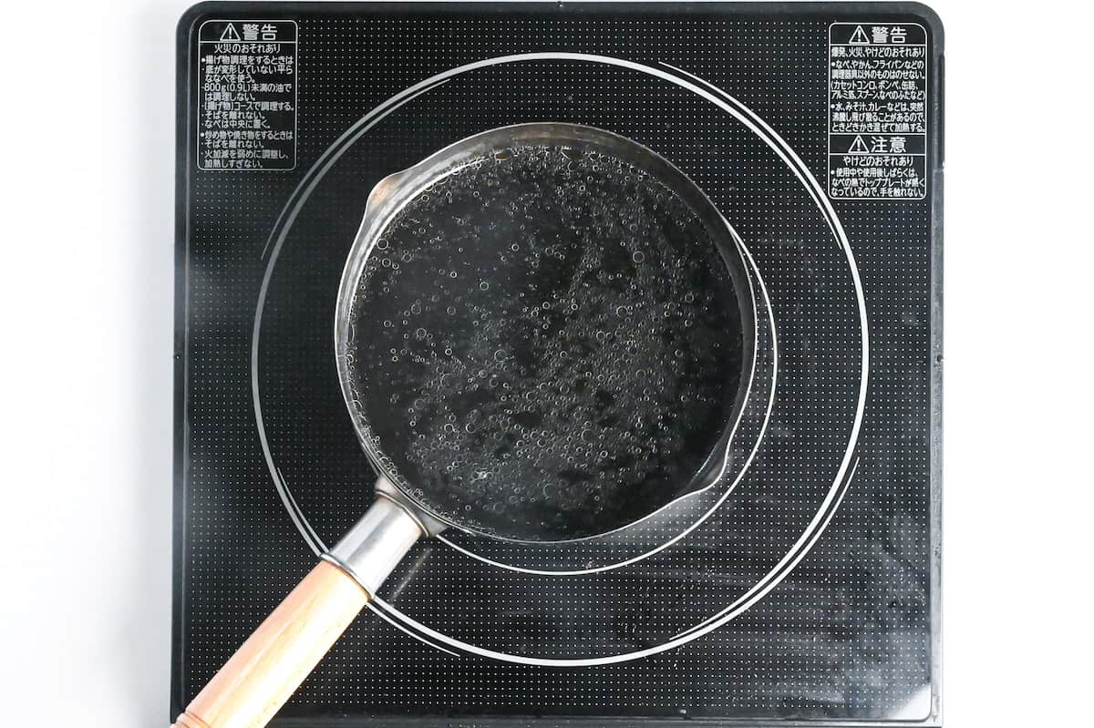 buta no kakuni broth in a sauce pan