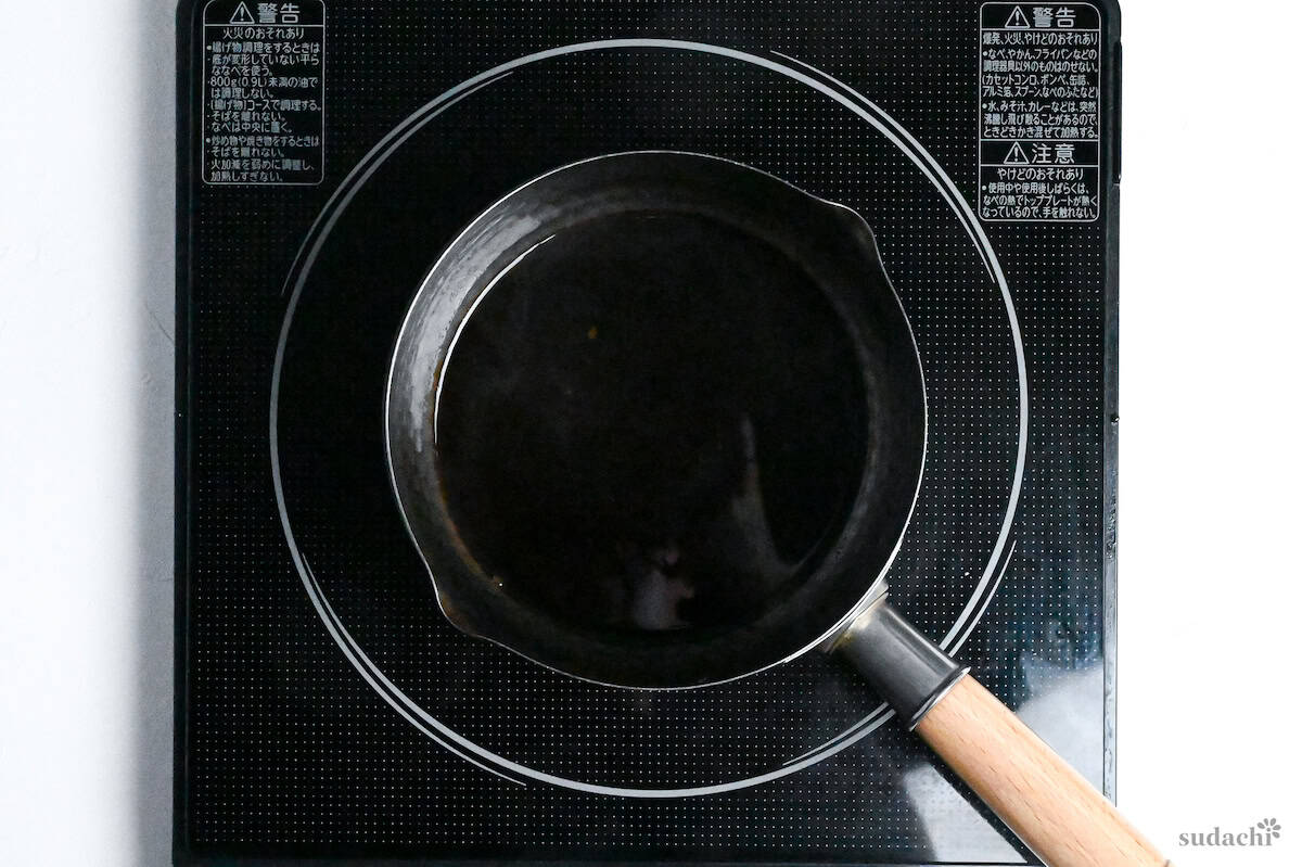 kushi age sauce heated in a small saucepan