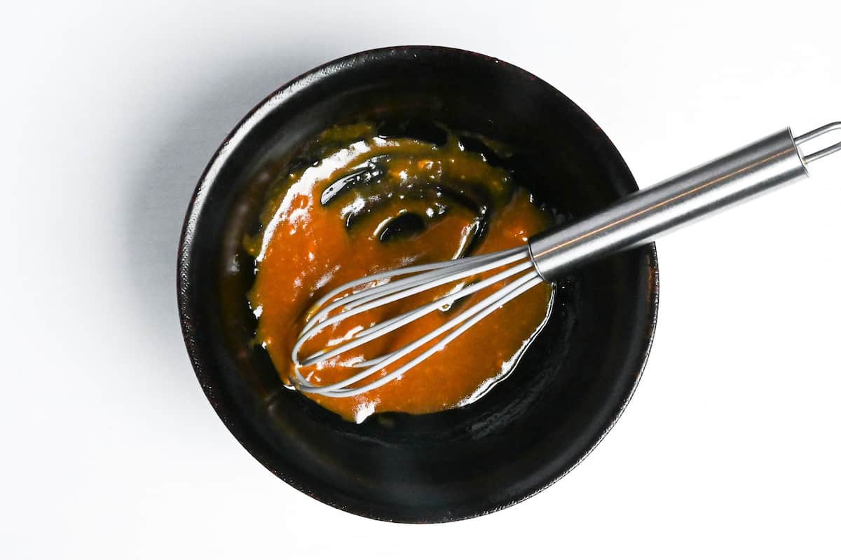 miso marinade mixed in a black bowl