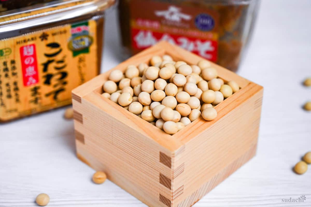 dried soy beans in a small wooden box