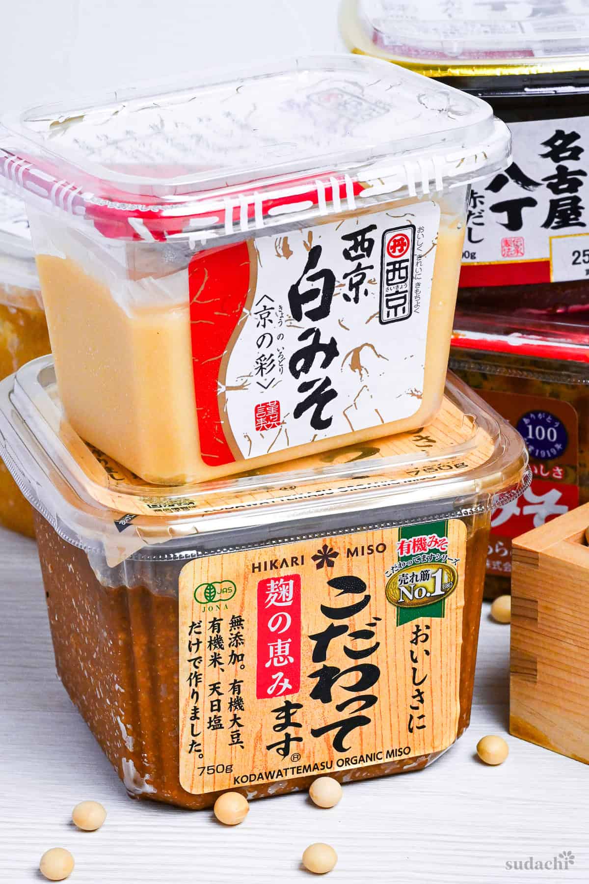 boxes of miso paste stacked on top of eachother