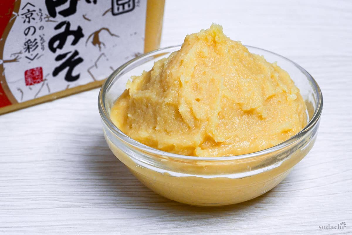 Kyoto style white miso in a small glass bowl with the branded box in the background