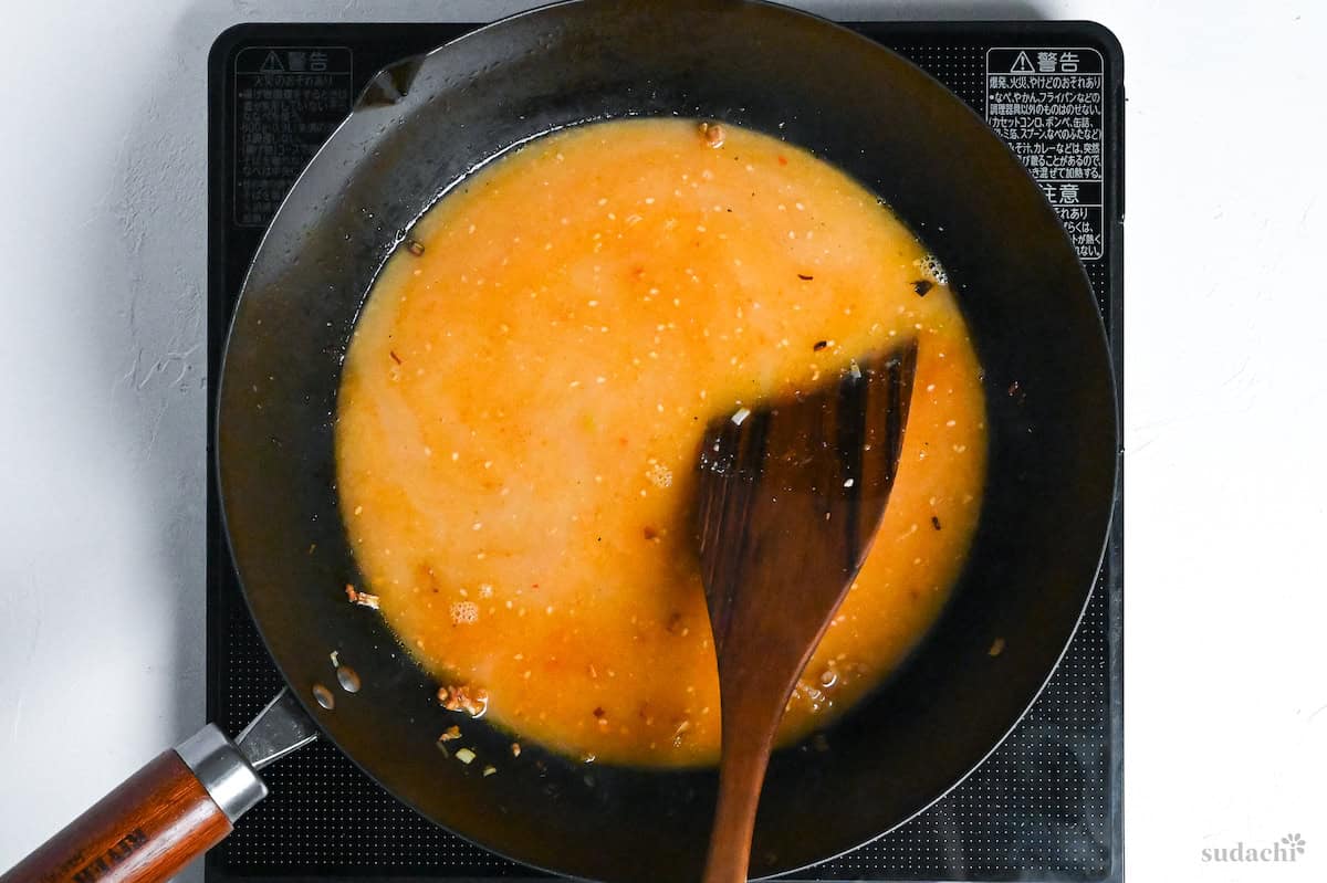 broth base added to wok to make miso ramen