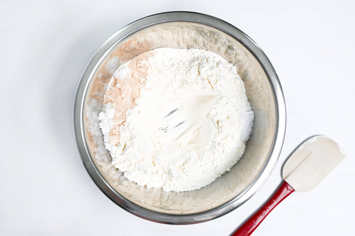 bread flour, active dry yeast, sugar and salt in a steel mixing bowl
