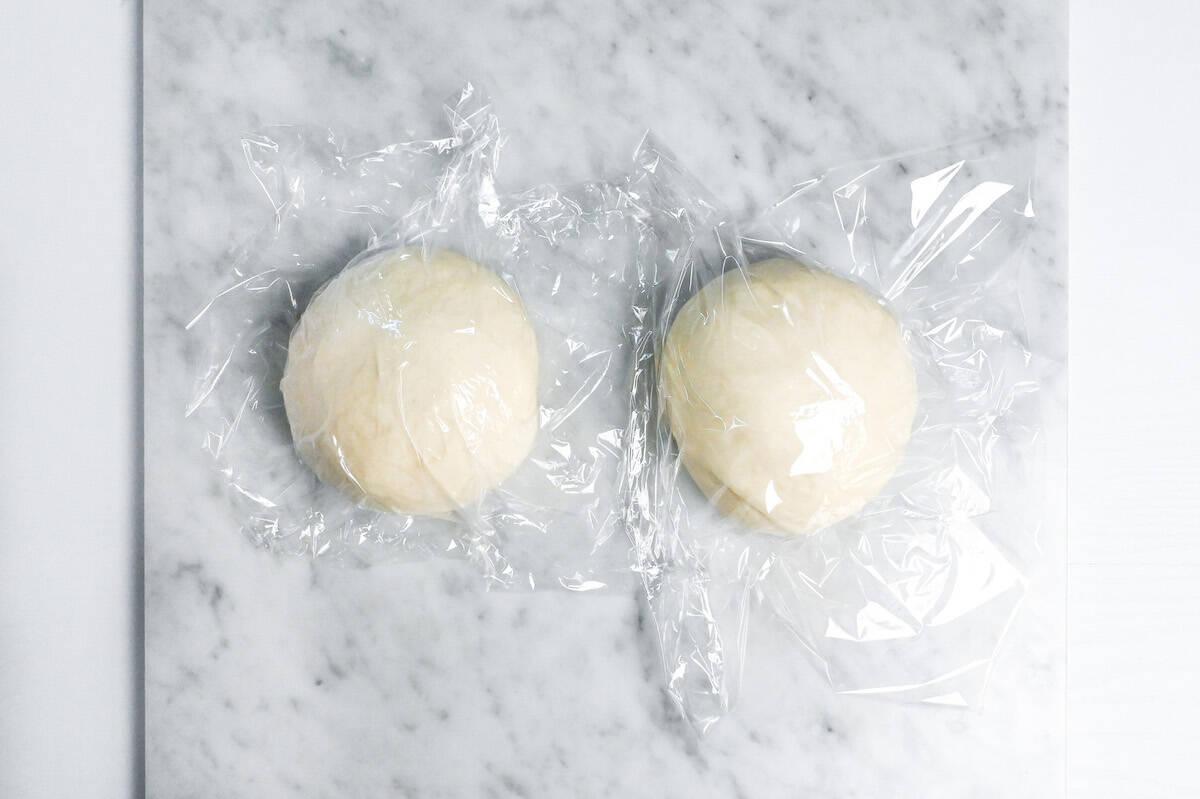 nama shokupan rolled into two balls and covered with plastic wrap (bench time)