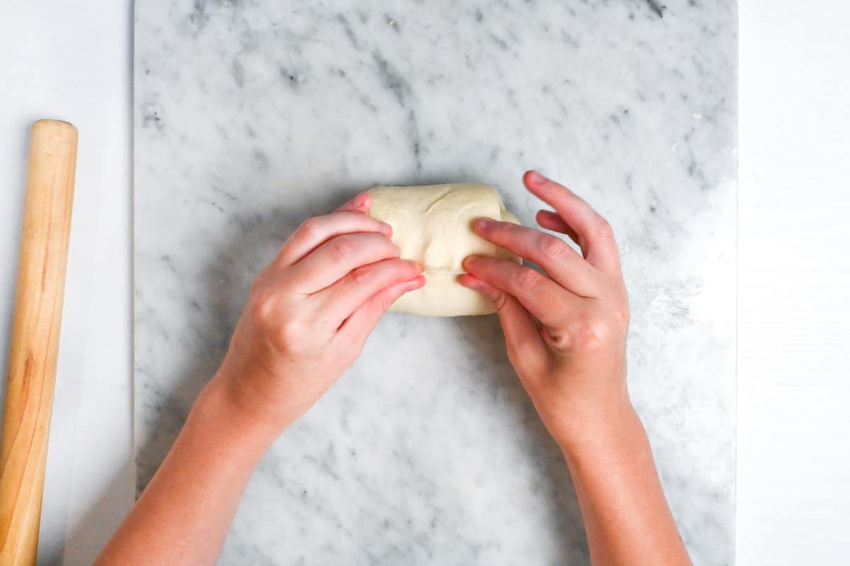 pinching seam of rolled nama shokupan dough