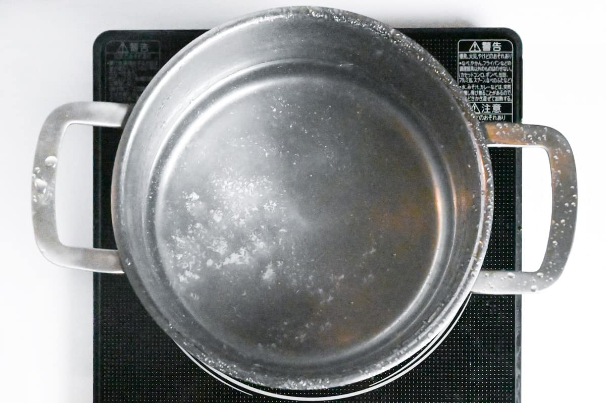 water in a large pot on the stove