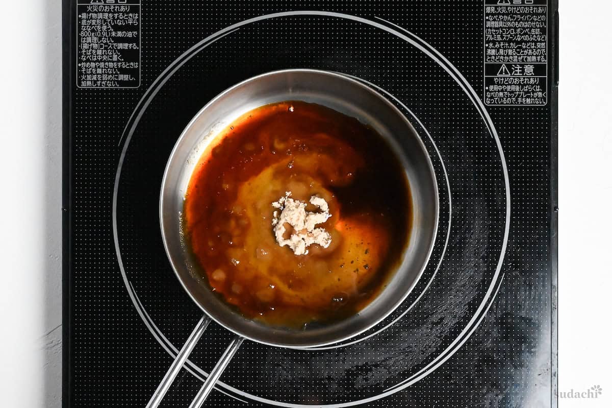 potato mochi sauce in a small saucepan on the stove top