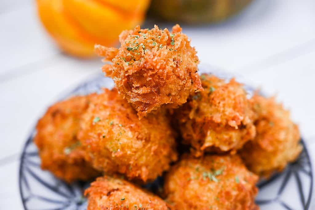 A stack of Japanese pumpkin croquettes "kabocha korokke"