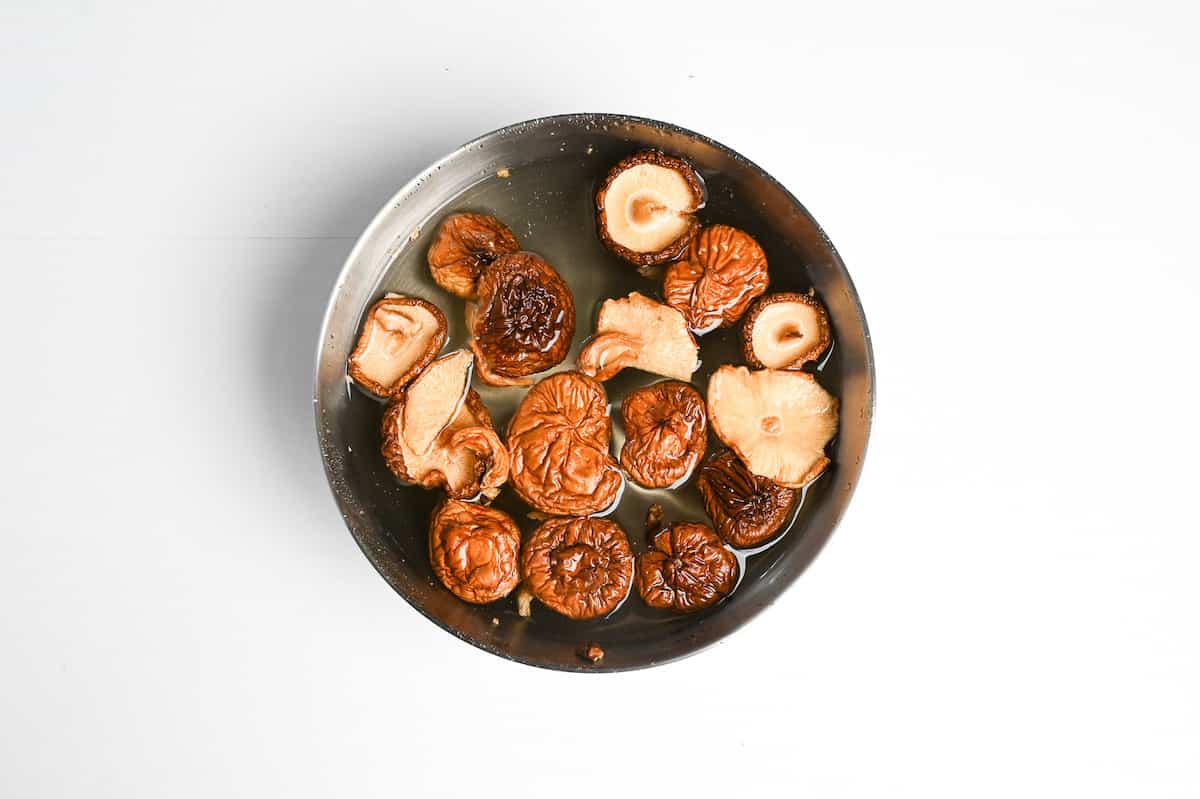 dried shiitake dashi in a bowl of water