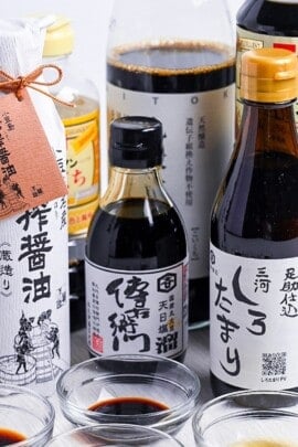 bottles of Japanese soy sauce on a white background