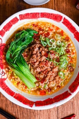 Spicy Japanese style tantanmen ramen in a red and white bowl