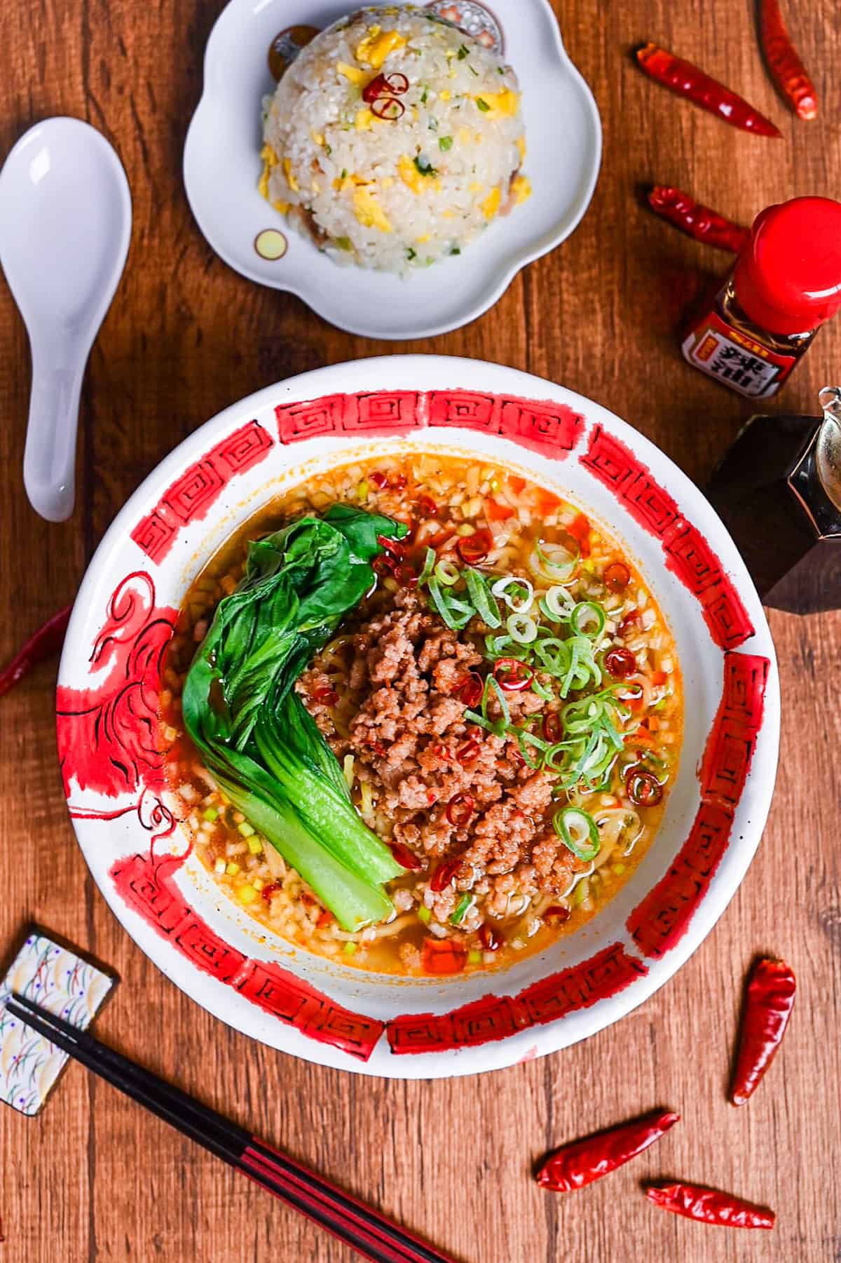 Spicy Japanese style tantanmen ramen in a red and white bowl