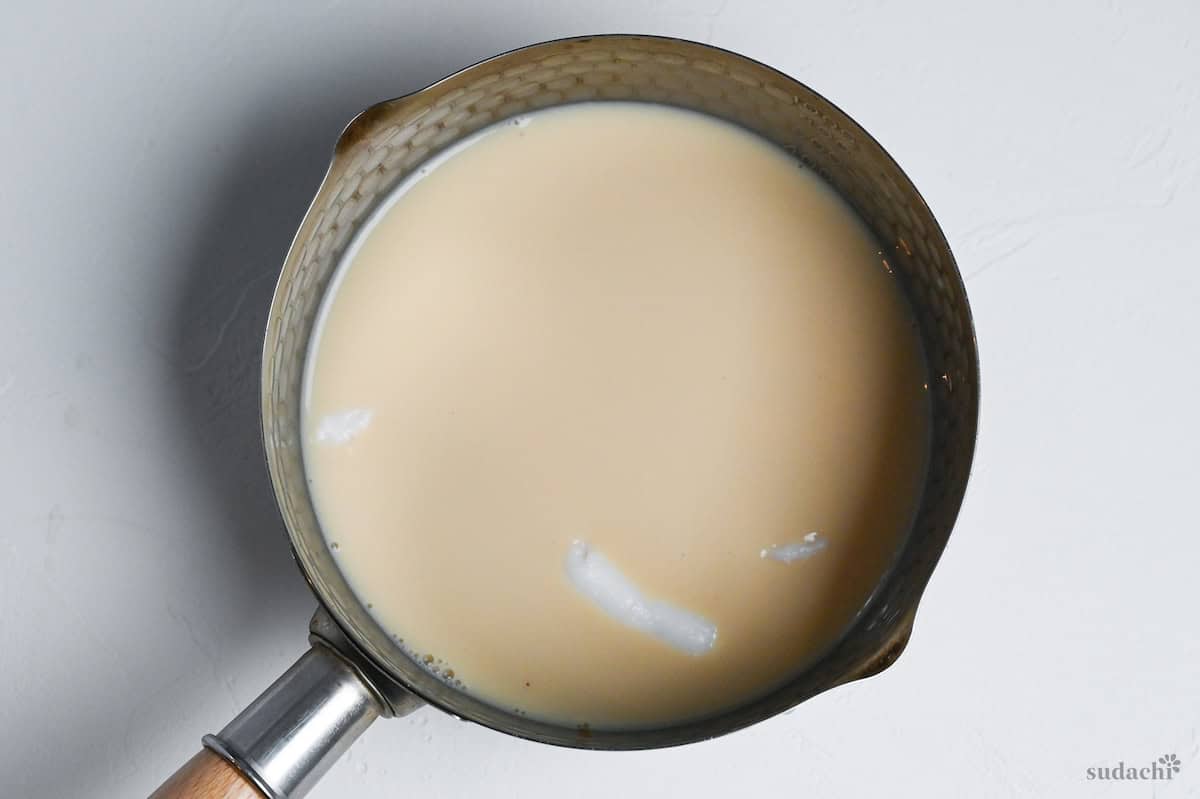 tonkotsu style ramen broth in a saucepan