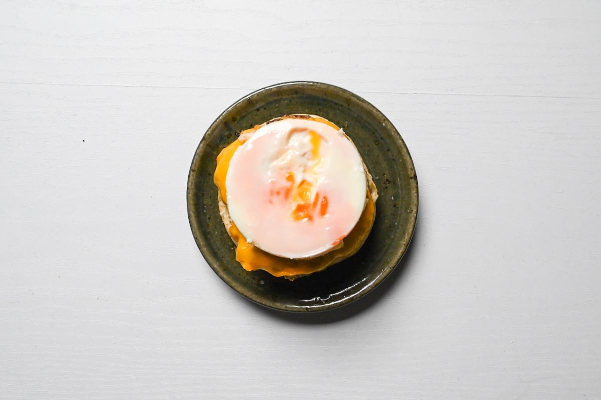 tsukimi burger patty, melted cheese and round egg on burger bun base