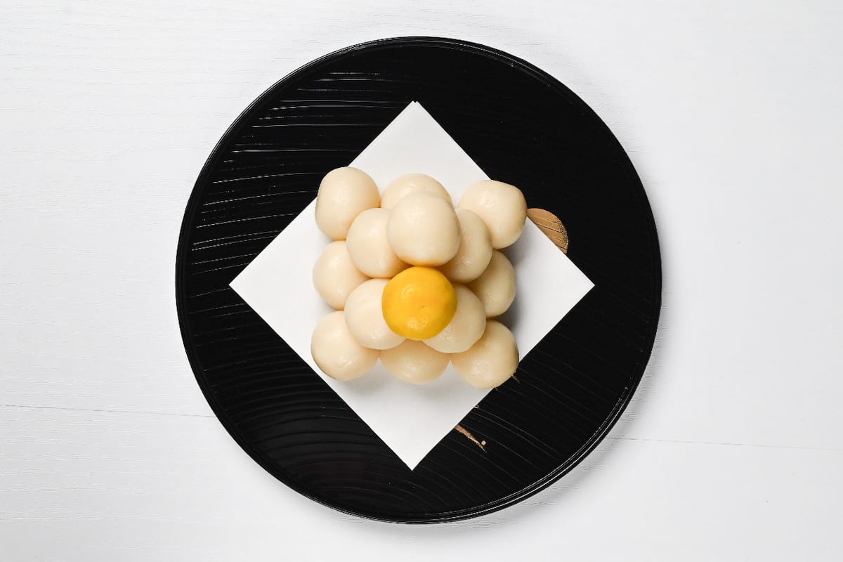 top of tsukimi dango pyramid, 1 white dango and 1 yellow dango