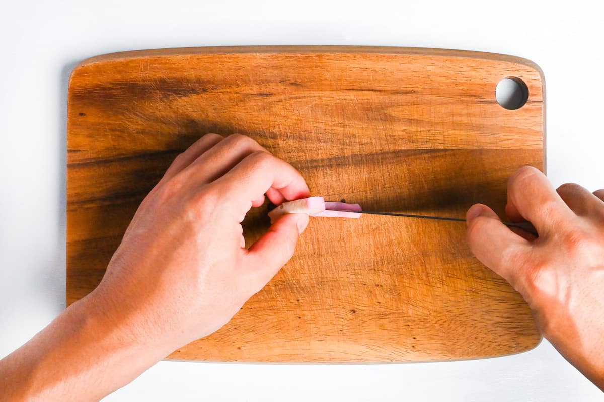 cutting the kamaboko to make rabbit ears