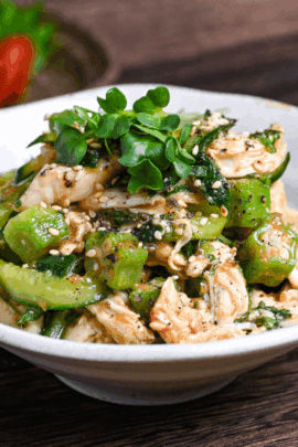 Poached Chicken Tender Salad with Fruity Japanese Style Dressing in a white dish thumb
