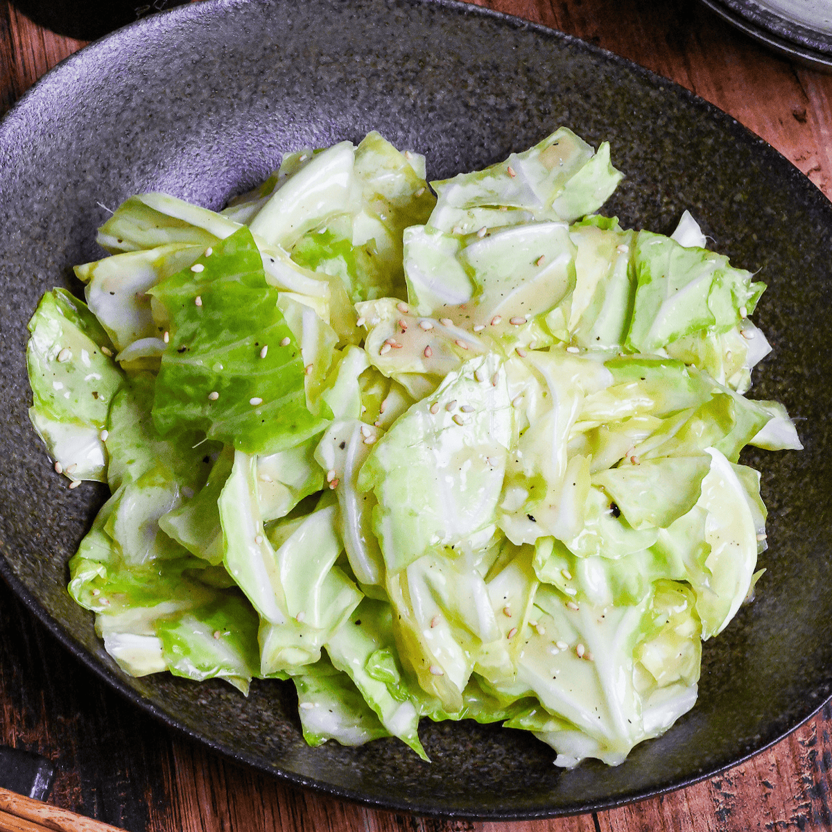 shiodare cabbage in a black bowl on wooden surface